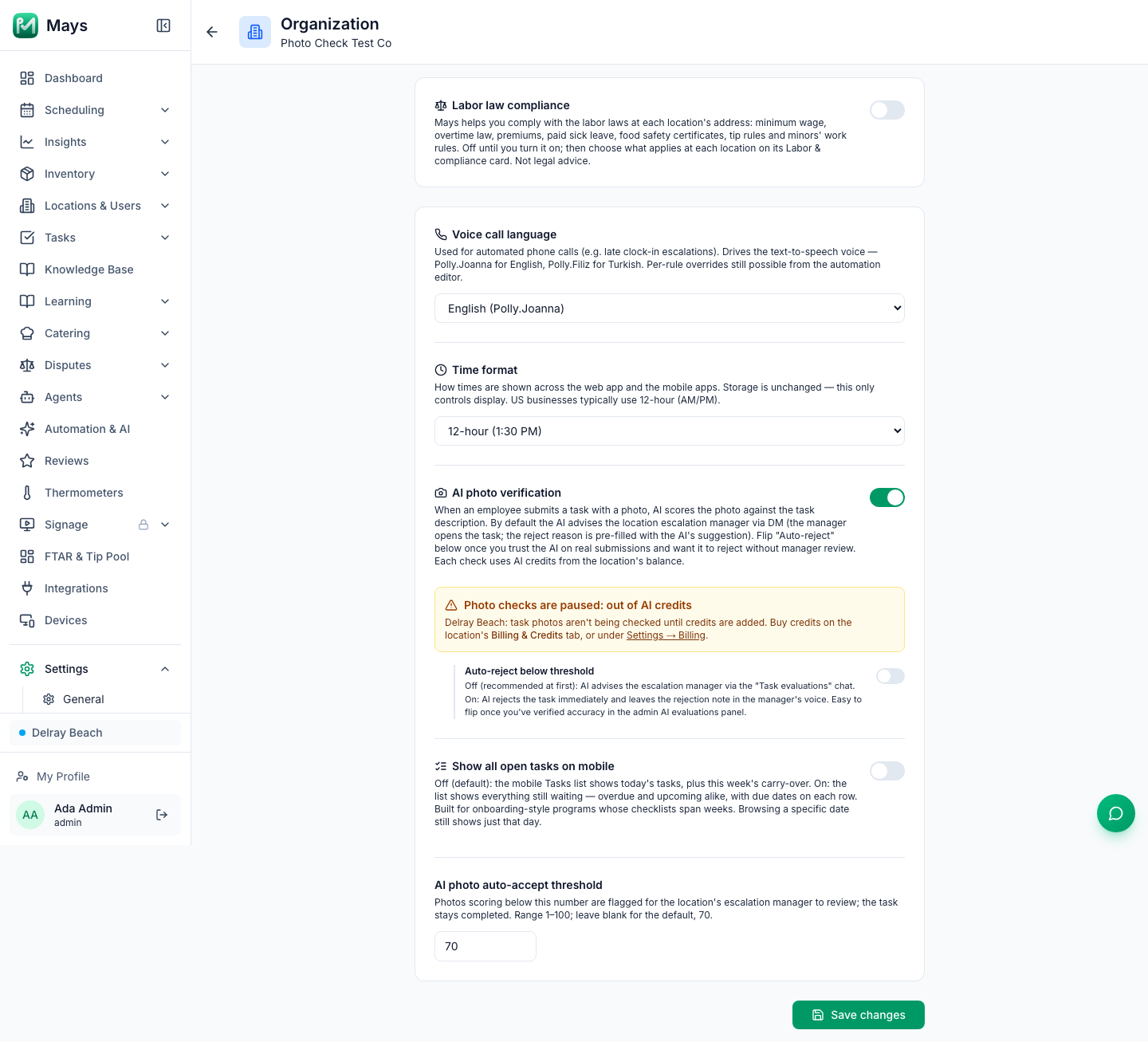 Settings → Organization with AI photo verification on and an amber banner under it: Photo checks are paused: out of AI credits, naming the Delray Beach location and pointing to Billing & Credits