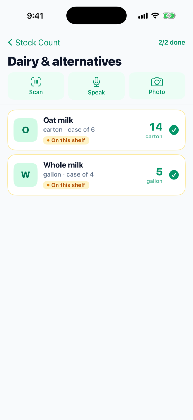 An item list in Guided mode on iPhone: Dairy & alternatives, 2/2 done, Oat milk counted at 14 cartons and Whole milk at 5 gallons, both On this shelf, with Scan, Speak and Photo buttons