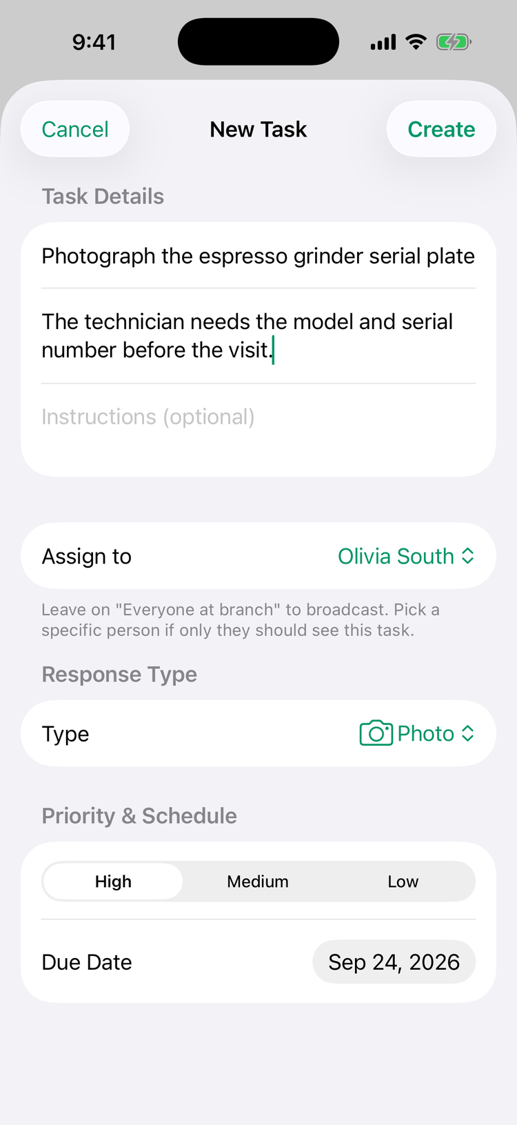 The New Task screen on iPhone: the title Photograph the espresso grinder serial plate, a description, Assign to Olivia South, Response Type Photo, Priority High and Due Date Sep 24, 2026