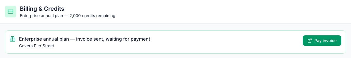 Settings → Billing with the Enterprise annual plan: invoice sent, waiting for payment, covering Pier Street, with the Pay invoice button