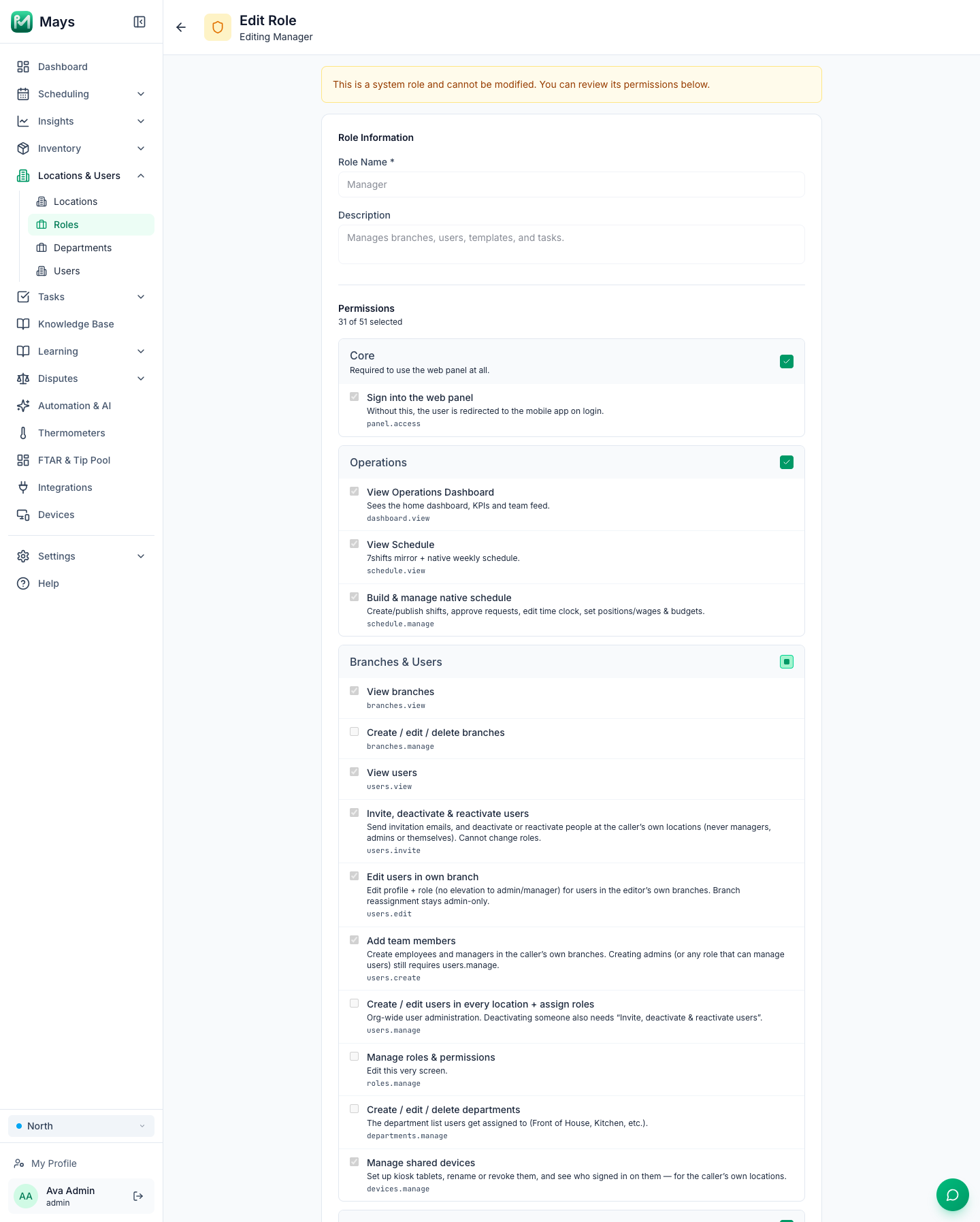 The Manager role opened read-only: the system-role notice, Role Name and Description, and the Permissions list with 31 of 51 selected — Core, Operations, and Branches & Users, where Invite, deactivate & reactivate users and Manage shared devices are ticked and Create / edit / delete branches, Create / edit users in every location + assign roles, Manage roles & permissions and Create / edit / delete departments are not
