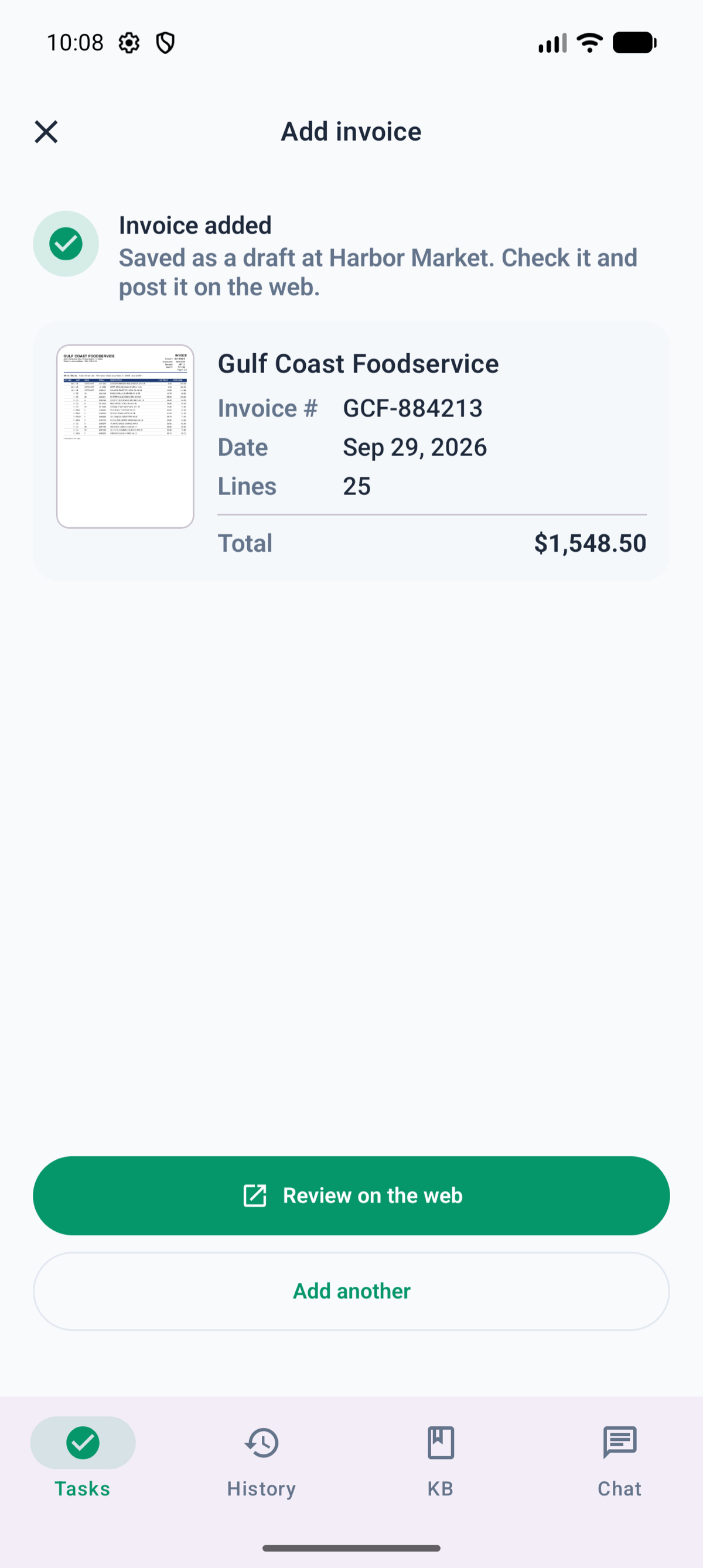 The result card after adding an invoice on Android: Invoice added, saved as a draft at Harbor Market, Gulf Coast Foodservice, invoice GCF-884213, Sep 29, 2026, 25 lines, total $1,548.50, with Review on the web and Add another