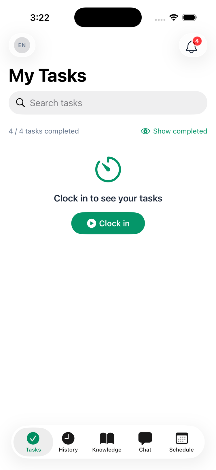 The Tasks tab in the iPhone app showing Clock in to see your tasks with a green Clock in button